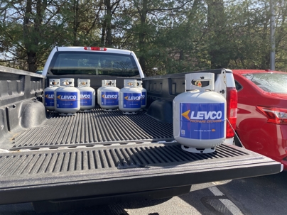 propane tanks in bed of pickup truck