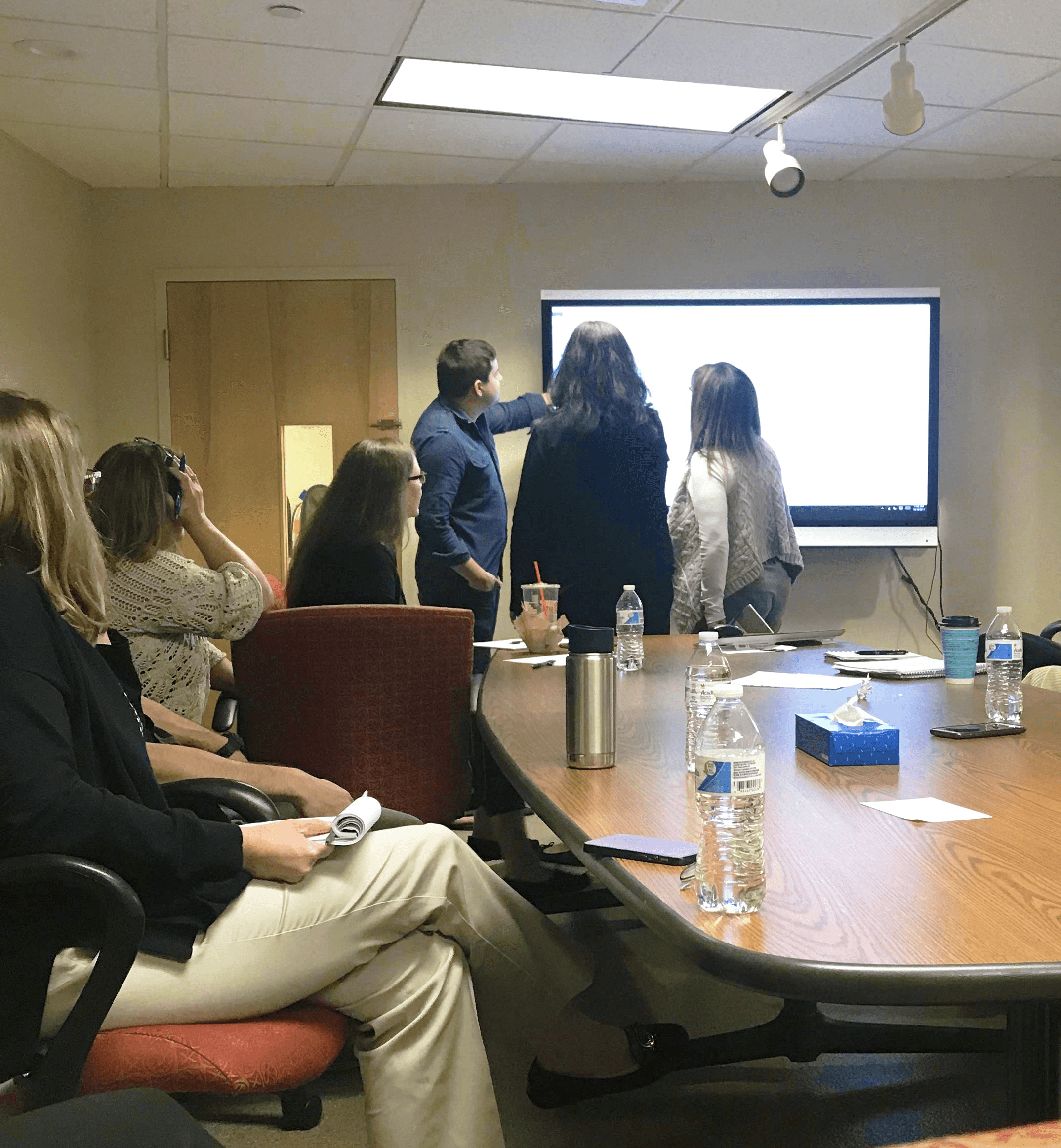 image of an office meeting